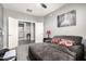 Spacious living room featuring a plush sofa, overhead lighting, and hardwood floors at 2425 W Bronco Butte Trl # 2028, Phoenix, AZ 85085