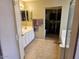 This practical bathroom features tile floors, a walk-in shower, and a vanity with storage at 2514 W Big Oak St, Phoenix, AZ 85085