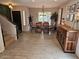 Bright dining area with wood table set, accent console, and tile floors for a cozy, inviting space at 2514 W Big Oak St, Phoenix, AZ 85085