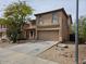 View of the front exterior of a two-story home with desert landscaping at 2514 W Big Oak St, Phoenix, AZ 85085