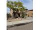 Charming two-story home with desert landscaping, tile roof and a covered front porch at 2514 W Big Oak St, Phoenix, AZ 85085