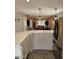 Bright eat-in kitchen featuring stainless steel appliances and breakfast bar at 2514 W Big Oak St, Phoenix, AZ 85085