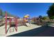Community playground featuring slides and other playground equipment at 2610 W Sat Nam Way, Phoenix, AZ 85086