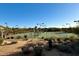 Outdoor tennis courts in a desert setting at 2610 W Sat Nam Way, Phoenix, AZ 85086