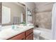 Well-maintained bathroom featuring single sink, vanity, and a shower-tub combination at 269 W Seaside Dr, Casa Grande, AZ 85122
