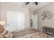 Bedroom with a ceiling fan, closet, art hanging on the wall at 269 W Seaside Dr, Casa Grande, AZ 85122