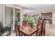 Spacious dining area with a wood table, chairs, and seamless flow into the kitchen at 269 W Seaside Dr, Casa Grande, AZ 85122
