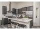 Well-equipped kitchen with modern finishes, a large island, and professional-grade stainless steel appliances at 28437 N 112Th Way, Scottsdale, AZ 85262