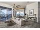 Bright and airy living room featuring an open floor plan and a seamless transition to the outdoors at 28437 N 112Th Way, Scottsdale, AZ 85262