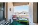 Comfortable balcony with cushioned seating and scenic neighborhood views at 3131 E Legacy Dr # 2055, Phoenix, AZ 85042