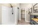 Bathroom with a shower, vessel sink with granite countertop, and closet, creating a functional space at 3131 E Legacy Dr # 2055, Phoenix, AZ 85042