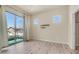 Bedroom with wood floors and natural light and access to an outdoor patio at 3131 E Legacy Dr # 2055, Phoenix, AZ 85042
