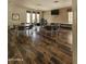 Community room featuring hardwood floors, multiple tables and chairs, a TV, and natural lighting at 3131 E Legacy Dr # 2055, Phoenix, AZ 85042
