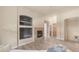 Living room featuring a fireplace and built-in shelving at 3131 E Legacy Dr # 2055, Phoenix, AZ 85042