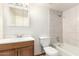 Bathroom with shower-tub combo, vanity and toilet at 3136 W Voltaire Ave, Phoenix, AZ 85029