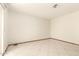 Neutral bedroom featuring tile flooring and lots of natural light at 3136 W Voltaire Ave, Phoenix, AZ 85029