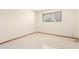 Bedroom with tile flooring and a window at 3136 W Voltaire Ave, Phoenix, AZ 85029