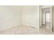 Bedroom with tile flooring, closet and an open door at 3136 W Voltaire Ave, Phoenix, AZ 85029