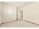 Bedroom featuring tile flooring, closet and neutral walls at 3136 W Voltaire Ave, Phoenix, AZ 85029
