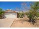 Charming single-story home with a well-maintained front yard and a two car garage at 3136 W Voltaire Ave, Phoenix, AZ 85029
