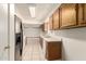 Functional kitchen featuring plenty of counter space, tile floors, and essential appliances at 3136 W Voltaire Ave, Phoenix, AZ 85029
