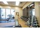 Well-equipped gym featuring a rowing machine, weight rack, and exercise bench, perfect for fitness enthusiasts at 34457 N Legend Trail Pkwy # 1013, Scottsdale, AZ 85262