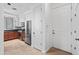 Well-lit kitchen featuring stainless steel appliances, granite counters, and a tile floor at 34457 N Legend Trail Pkwy # 1013, Scottsdale, AZ 85262
