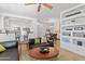 Bright and open living area with bar seating, dining area, and comfortable leather sofas at 34457 N Legend Trail Pkwy # 1013, Scottsdale, AZ 85262