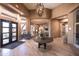 This is a lobby with a seating area, a fireplace and other nice interior design elements at 34457 N Legend Trail Pkwy # 1013, Scottsdale, AZ 85262