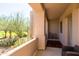 Cozy covered patio featuring desert views and comfortable seating with a brown accent rug at 34457 N Legend Trail Pkwy # 1013, Scottsdale, AZ 85262