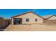 Exterior elevation of back of home, showing backyard with patio at 34463 N Karan Swiss Cir, San Tan Valley, AZ 85143