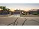 Charming single-story home featuring desert landscaping and a two-car garage at 34463 N Karan Swiss Cir, San Tan Valley, AZ 85143