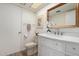 Updated bathroom with a marble vanity, modern fixtures, and a clean, well-lit space for personal care at 3730 W Michigan Ave, Glendale, AZ 85308