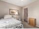 Neutral bedroom featuring a ceiling fan, a window, and a carpeted floor; a perfect tranquil retreat at 3730 W Michigan Ave, Glendale, AZ 85308