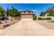 Charming two-story home with a large driveway, low maintenance landscaping, and an attached two car garage at 3730 W Michigan Ave, Glendale, AZ 85308