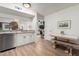 Stylish kitchen with granite countertops, stainless steel appliances, and a breakfast nook with a wood table at 3730 W Michigan Ave, Glendale, AZ 85308