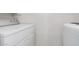 A well-kept, conveniently located laundry room with white washer and dryer at 3730 W Michigan Ave, Glendale, AZ 85308