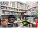 Walk-in pantry offering ample shelving and storage solutions for organized kitchen supplies and groceries at 3730 W Michigan Ave, Glendale, AZ 85308