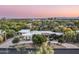 Beautiful aerial view of the estate showcasing the spacious layout, mature trees, and desert landscaping at 3901 E San Miguel Ave, Paradise Valley, AZ 85253