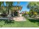 Stylish backyard with a covered patio, comfortable seating, and views of Camelback Mountain at 3901 E San Miguel Ave, Paradise Valley, AZ 85253