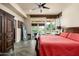 Serene main bedroom featuring patio access, tile flooring, and an abundance of natural light at 3901 E San Miguel Ave, Paradise Valley, AZ 85253