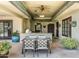 Charming outdoor kitchen with a built-in grill and spacious dining area under a covered patio at 3901 E San Miguel Ave, Paradise Valley, AZ 85253