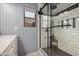 Updated bathroom featuring a glass shower with a tiled surround, and modern fixtures at 4377 S Soboba St, Gilbert, AZ 85297