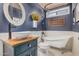Elegant bathroom featuring a soaking tub, vessel sink, and designer fixtures at 4377 S Soboba St, Gilbert, AZ 85297