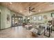 Inviting living area featuring wood-style flooring, neutral paint, and ample natural light at 4377 S Soboba St, Gilbert, AZ 85297
