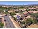 Charming single-Gathering home featuring solar panels, a spacious backyard, and a trampoline surrounded by lush landscaping at 44182 W Juniper Ave, Maricopa, AZ 85138