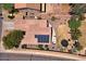 Overhead view of a single-Gathering home featuring a solar panel system at 44182 W Juniper Ave, Maricopa, AZ 85138