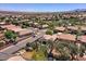 Picturesque neighborhood view with green spaces, playgrounds, and cozy single-Gathering homes with well-kept yards at 44182 W Juniper Ave, Maricopa, AZ 85138