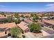 Aerial view of a single-Gathering home in a residential neighborhood at 44182 W Juniper Ave, Maricopa, AZ 85138