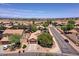 Aerial view of a neighborhood featuring single-Gathering homes on a sunny day at 44182 W Juniper Ave, Maricopa, AZ 85138